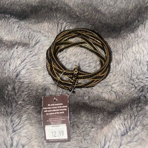 Gold and black bracelet